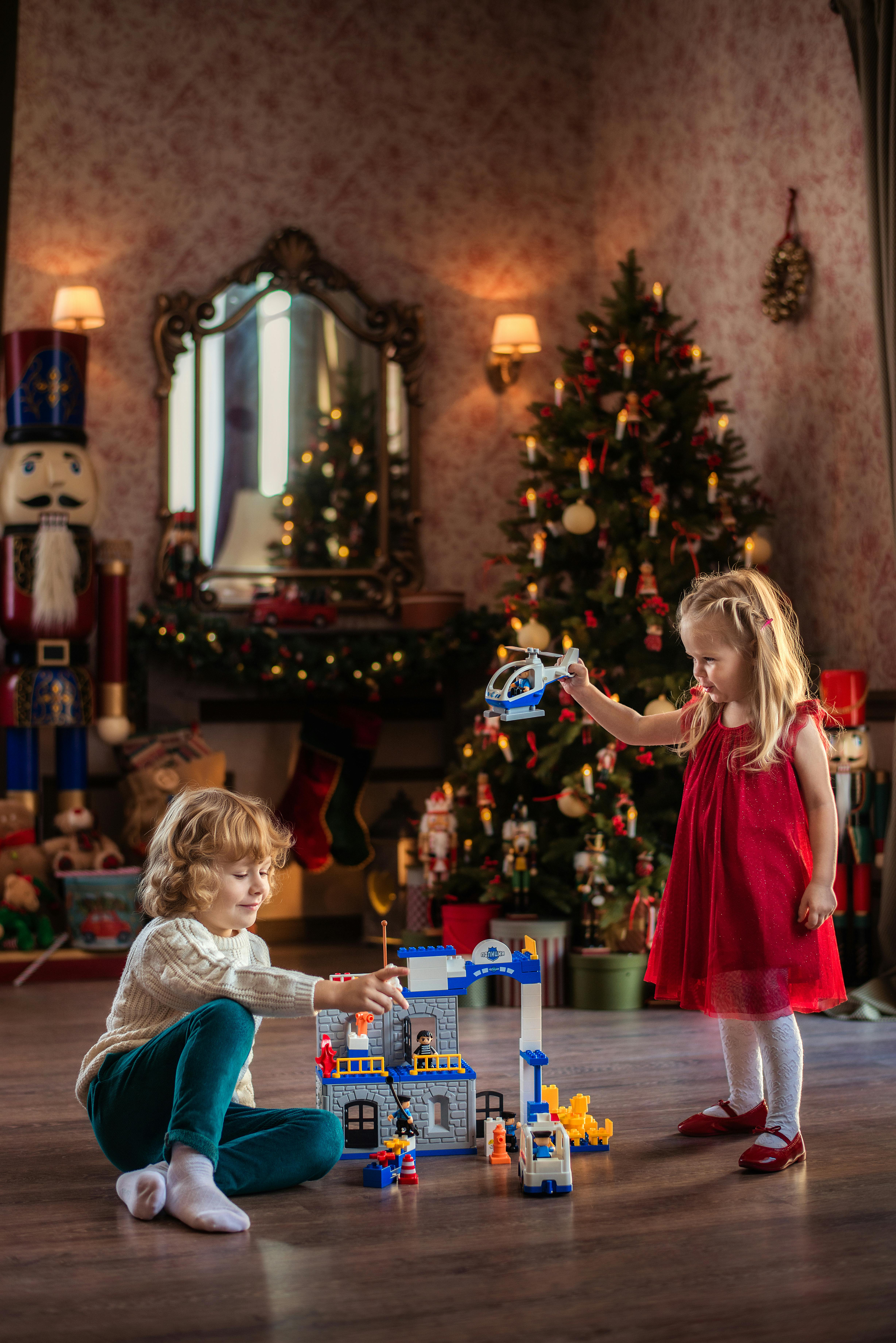 Explore local neighborhoods known for their Christmas light displays. Set up a photoshoot in front of the elaborate decorations. Use long exposure to capture the lights sparkling around the family.